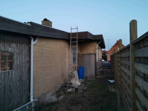 Renovering af facade og tagudhæng på murstenshus